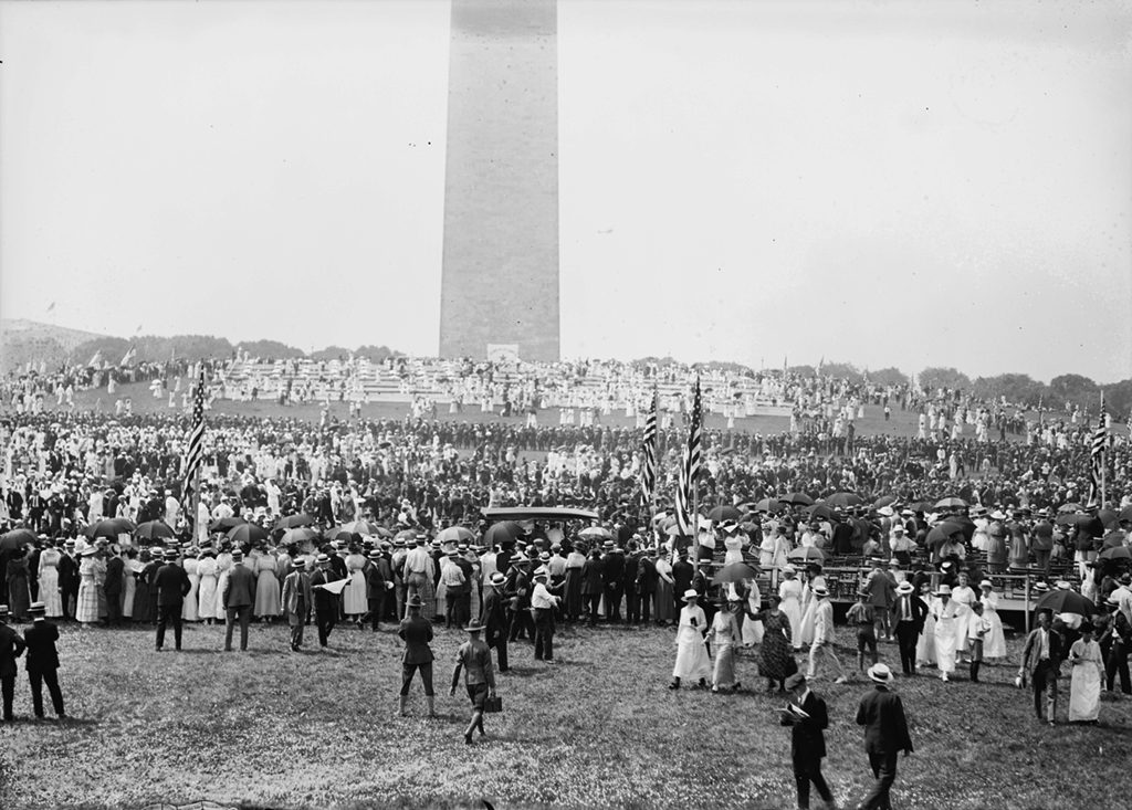 Crowds gathered around the Washington Monument for a Fourth of July celebration. Photograph via National Photo Company Collection (Library of Congress).