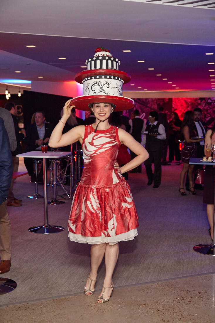 https://www.washingtonian.com/wp-content/uploads/2016/11/washington-post-woman-in-cake-hat2.jpg