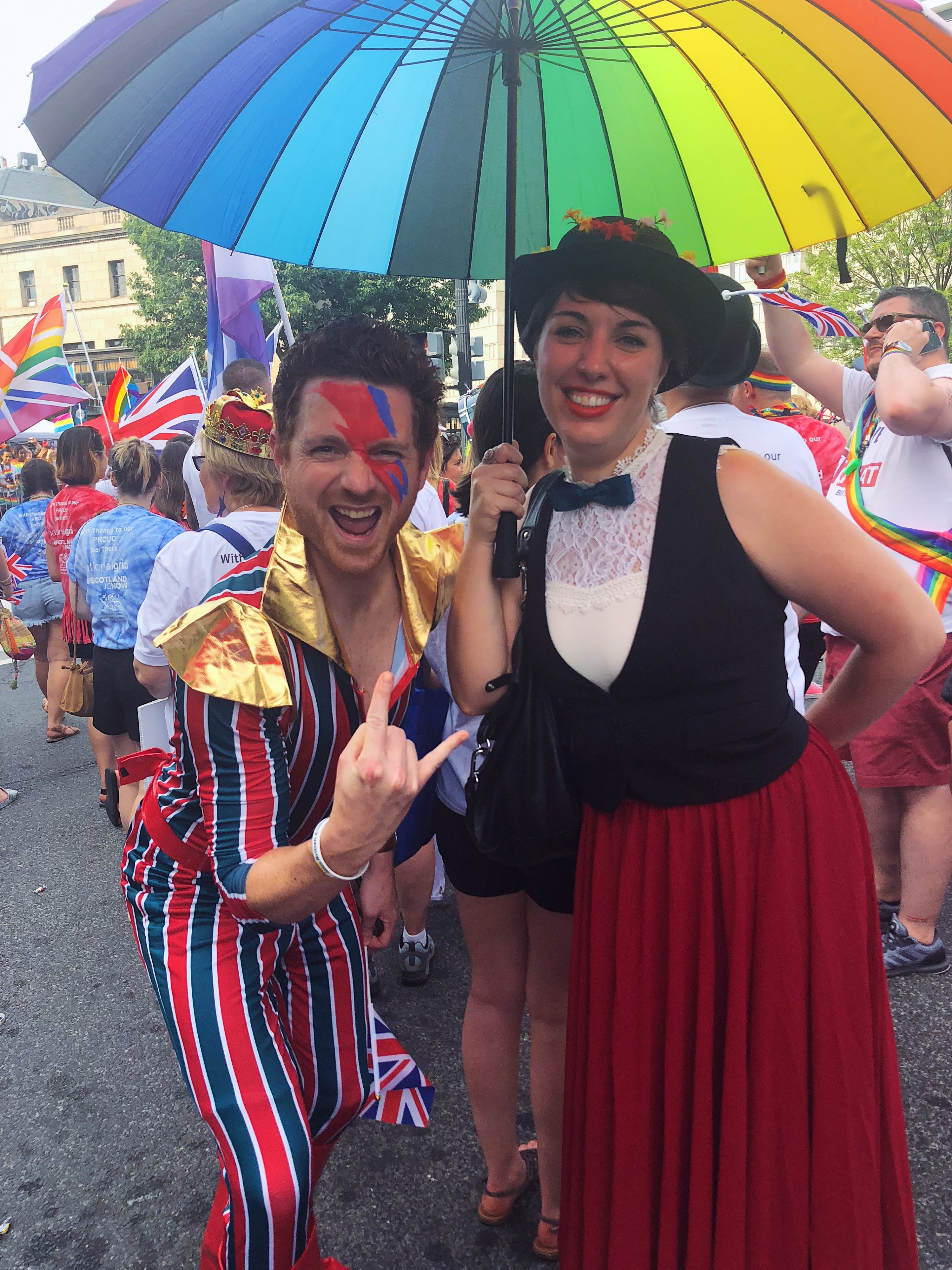 David Bowie and Mary Poppins underneath a rainbow umbrella. Photograph by Daniella Byck.
