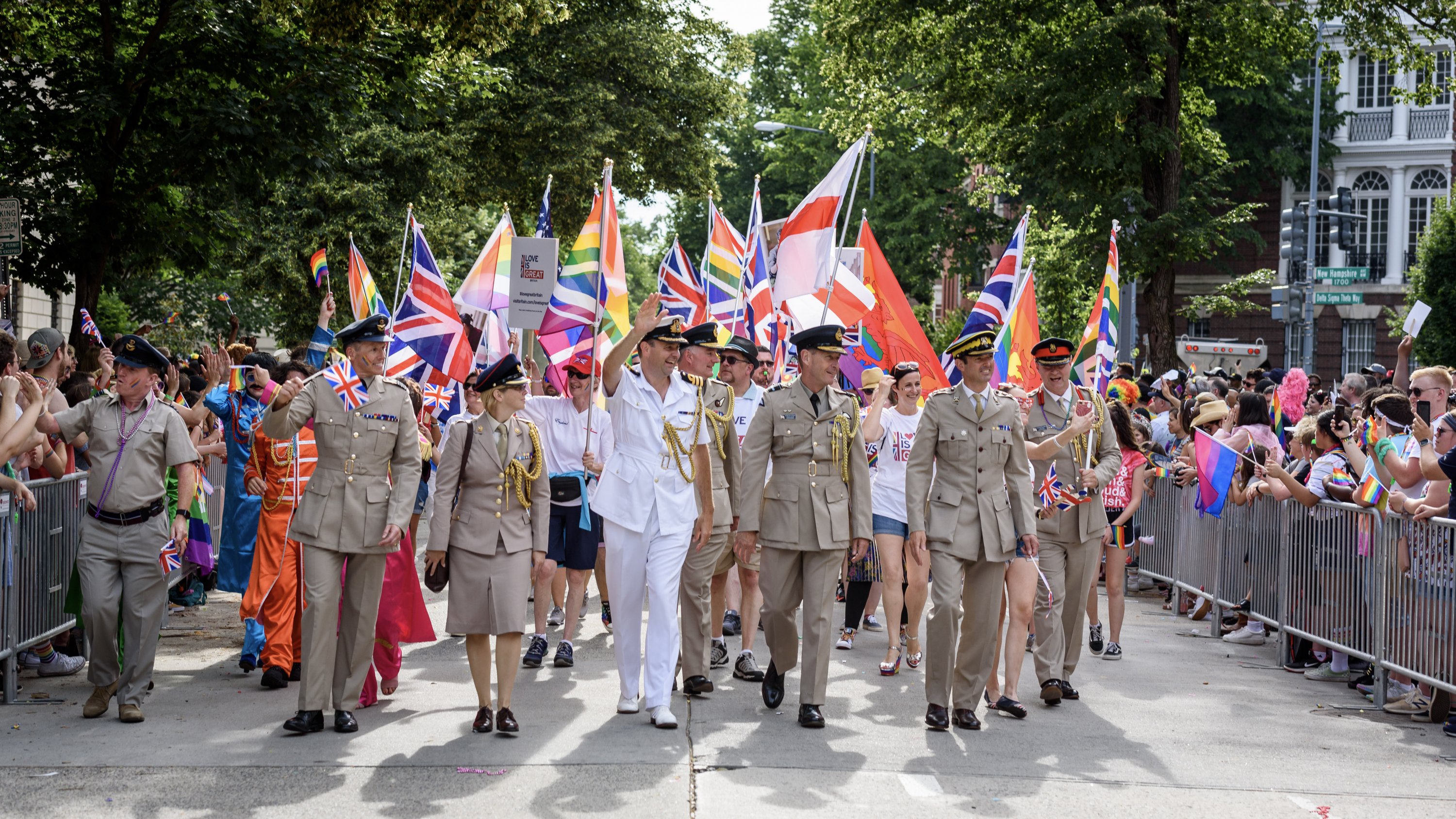 Clad in military uniforms, embassy staff waved rainbow Union Jack flags. Photograph by Scott Marder. 