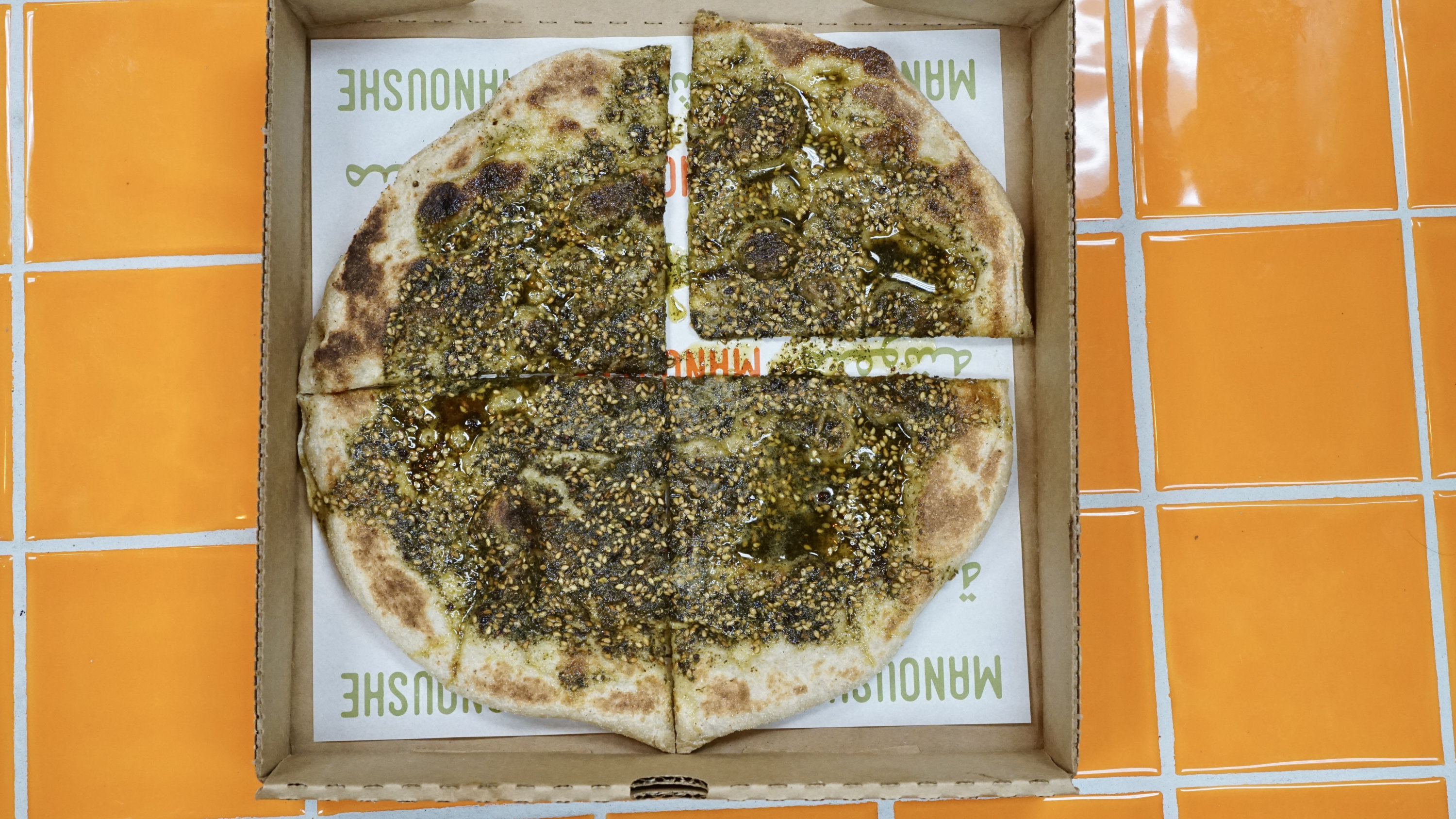 The classic manoushe is topped with za'atar. Photo courtesy of Z&Z. 