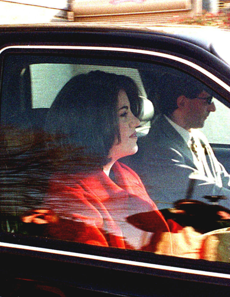 Washington, DC - February 26, 1998 -- Monica Lewinsky leaves the Watergate Apartments this morning on the way to the Cosmos Club to meet with her lawyer. Credit: Ron Sachs/CNP - Photolink - NO WIRE SERVICE - - Washingtonian