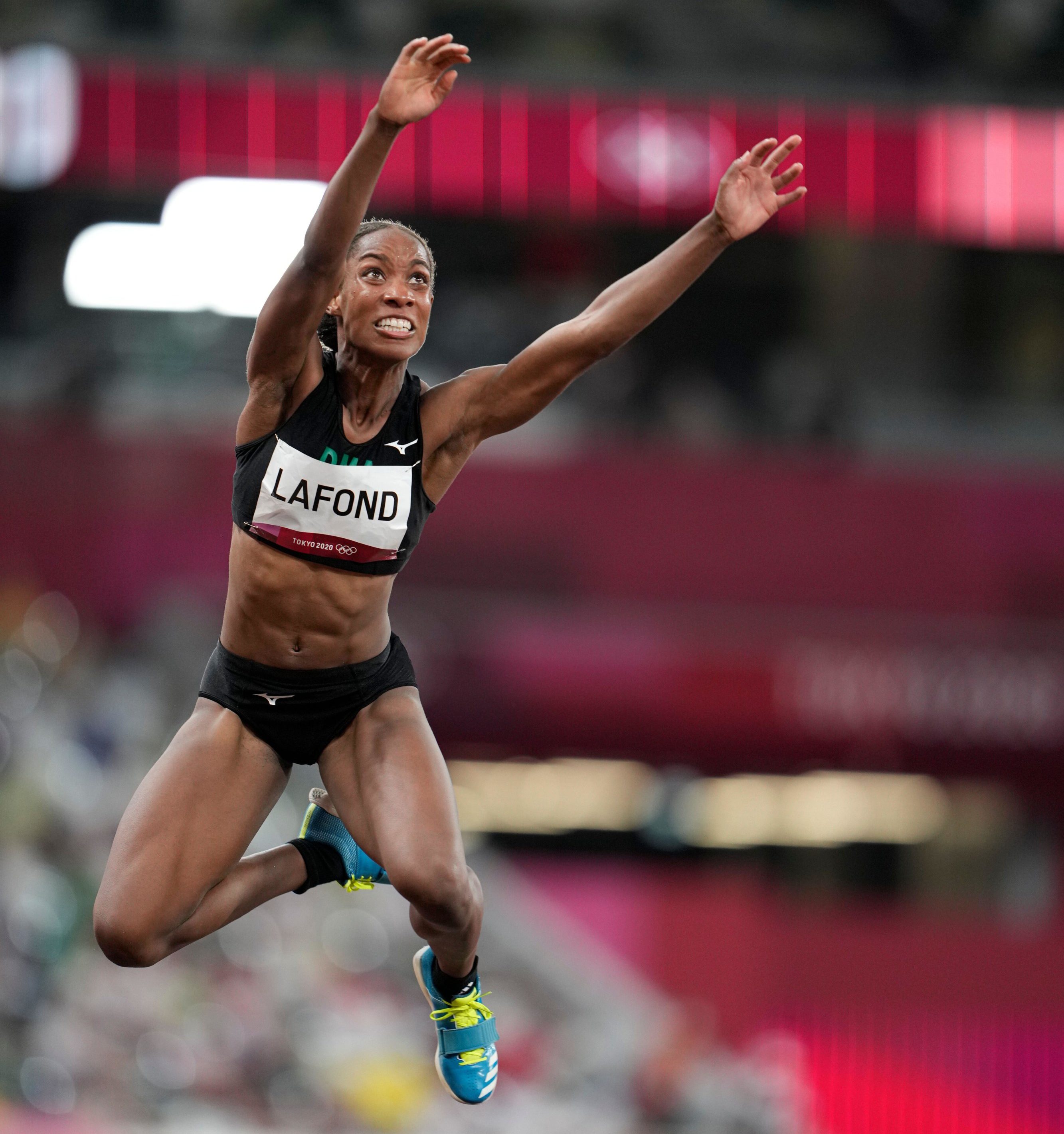 Thea Lafond competing in the Triple Jump at the 2020 Tokyo Olympics. - Washingtonian
