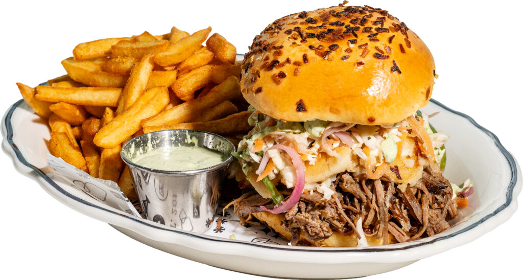 Silvie's-Big-Bun_Braised-Brisket_cooked-slow,-Cheese-Pupusa,-Jalapeño-Slaw-&-finished-with-Lime-Crema-on-Onion-Challah-Bun_-Buffalo&Bergen_ClevelandPark_Birch-Thomas-update - Washingtonian