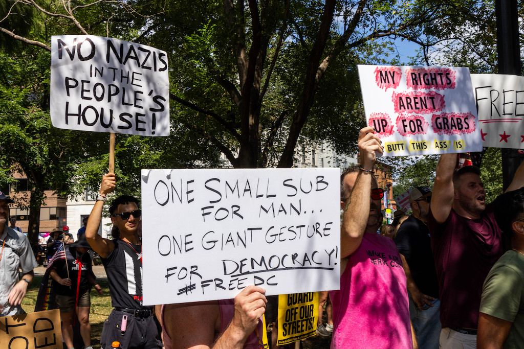 sandwich guy protest signs 1 - Washingtonian