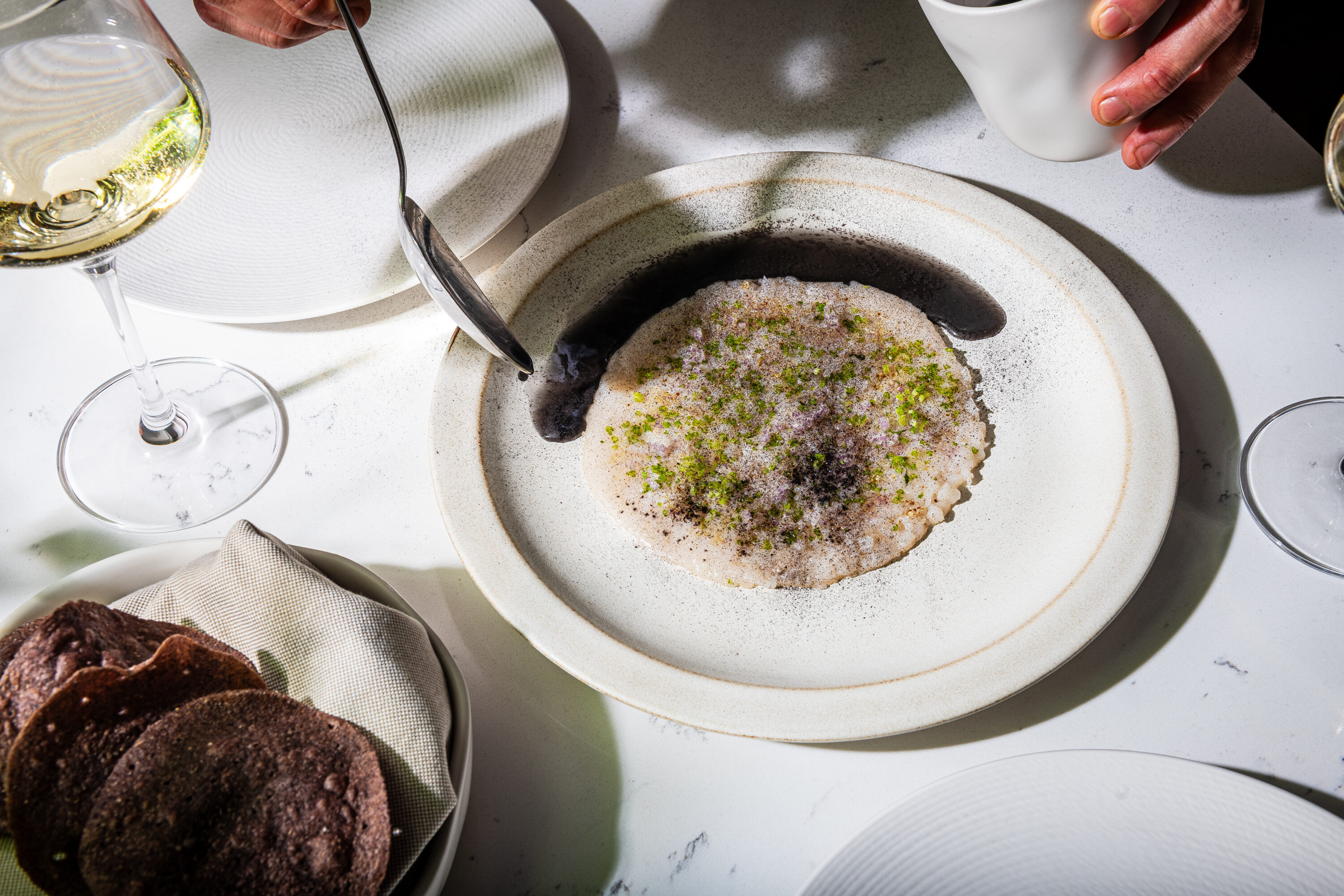 Maine scallop aguachile, burnt onion, avocado, Sichuan pepper, blue corn tostadas.dng-5 - Washingtonian