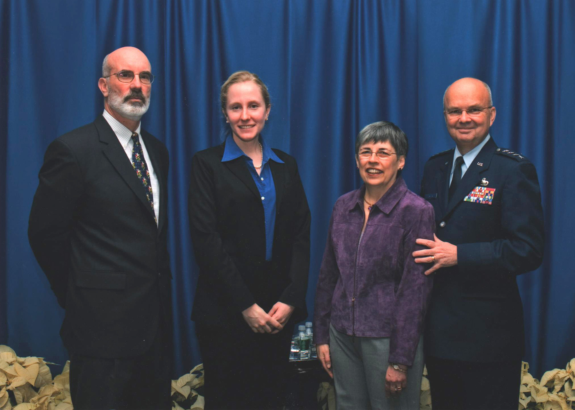 Abigail is standing with former Director of the CIA Michael Hayden_right - Washingtonian