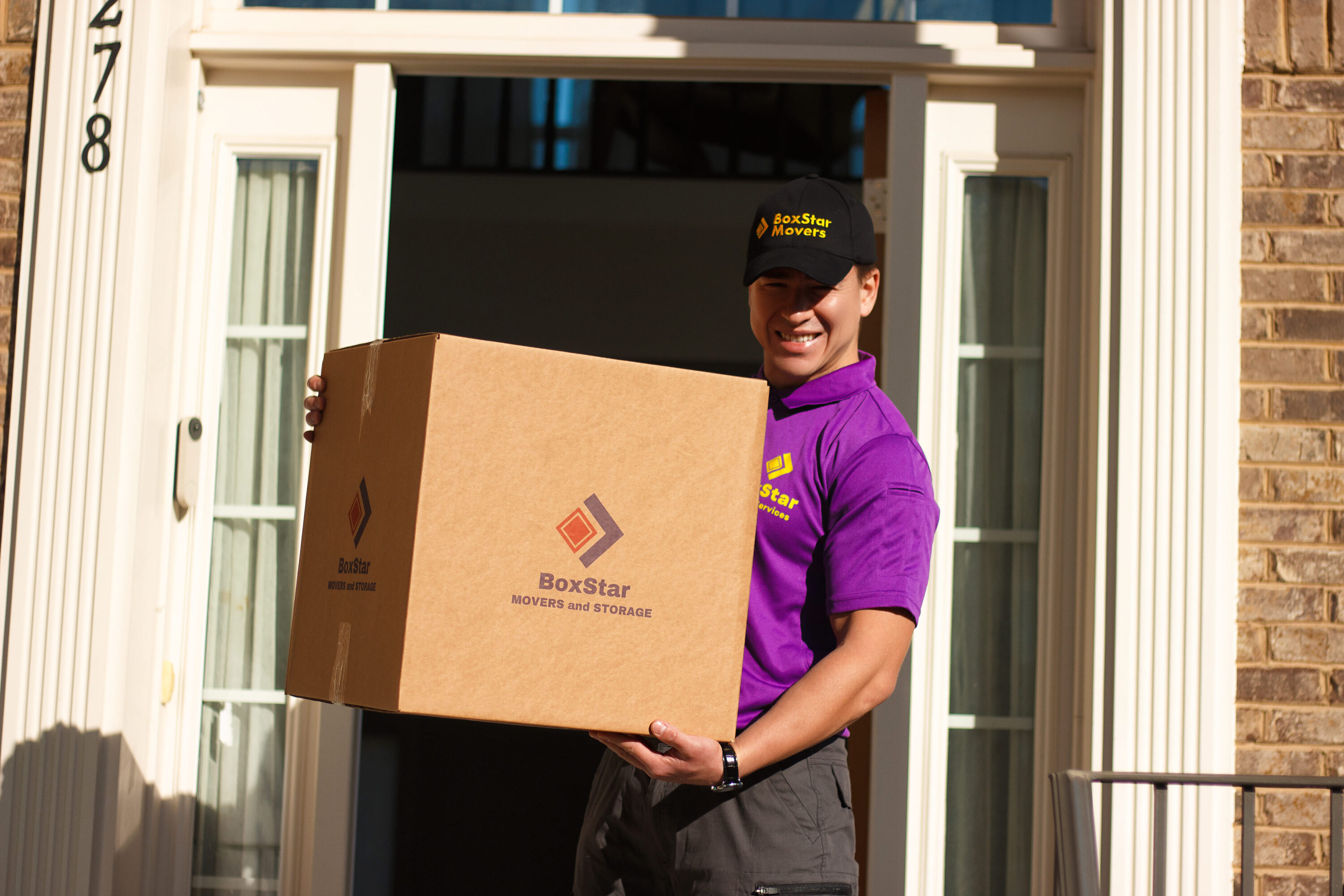 ManagerHoldingBrandedBox - Washingtonian