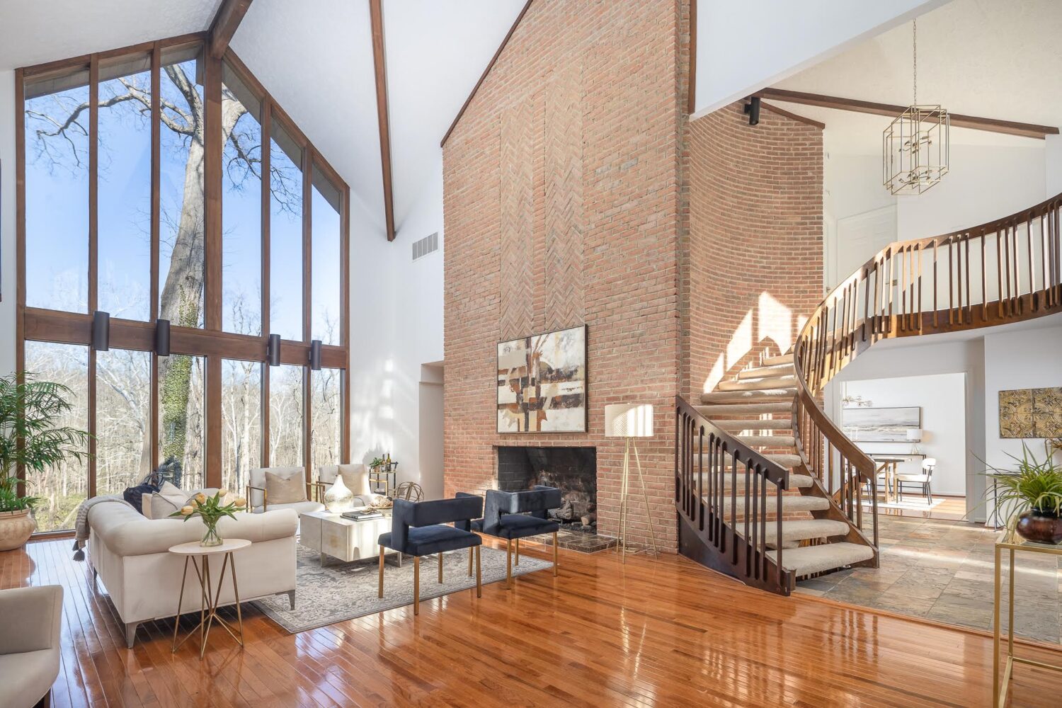 A Soaring Spiral Staircase, New York City-Style Industrial Flair, and Floor-to-Ceiling Windows With a Wooded View: Inside Three Open Houses Happening This Weekend