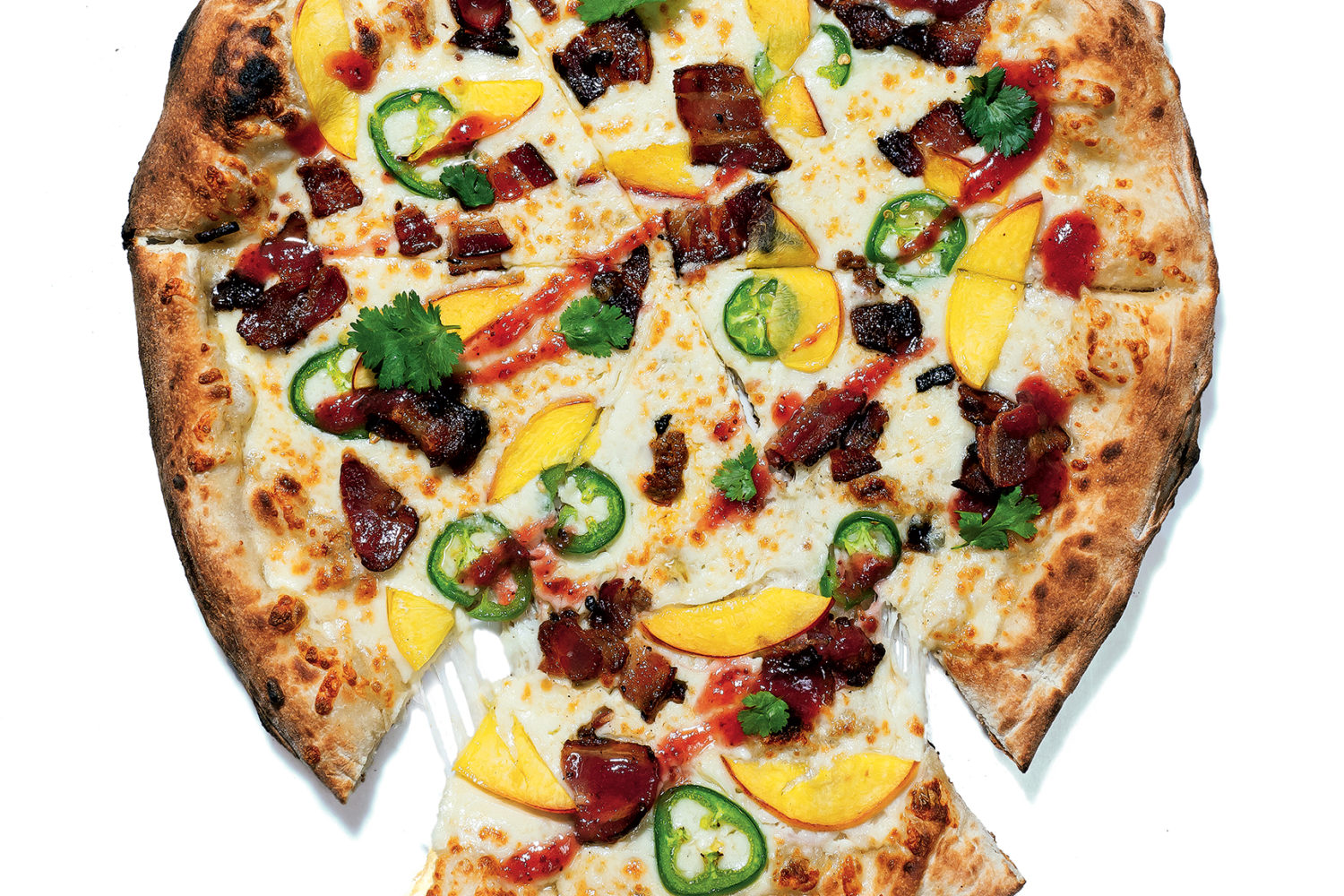 Timber Pizza Co.'s nectarine-and-bacon pie. Photograph by Scott Suchman. - Washingtonian Timber Pizza Co.'s nectarine-and-bacon pie. Photograph by Scott Suchman.