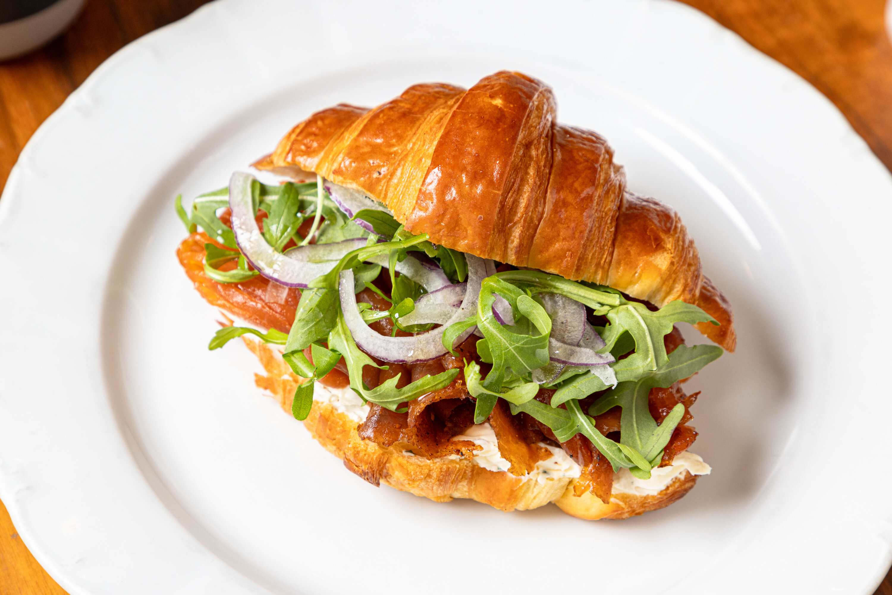 Smoked Salmon Croissant Breakfast Sandwich at Zinnia. Photo courtesy of Farrah Skeiky/Zinnia.