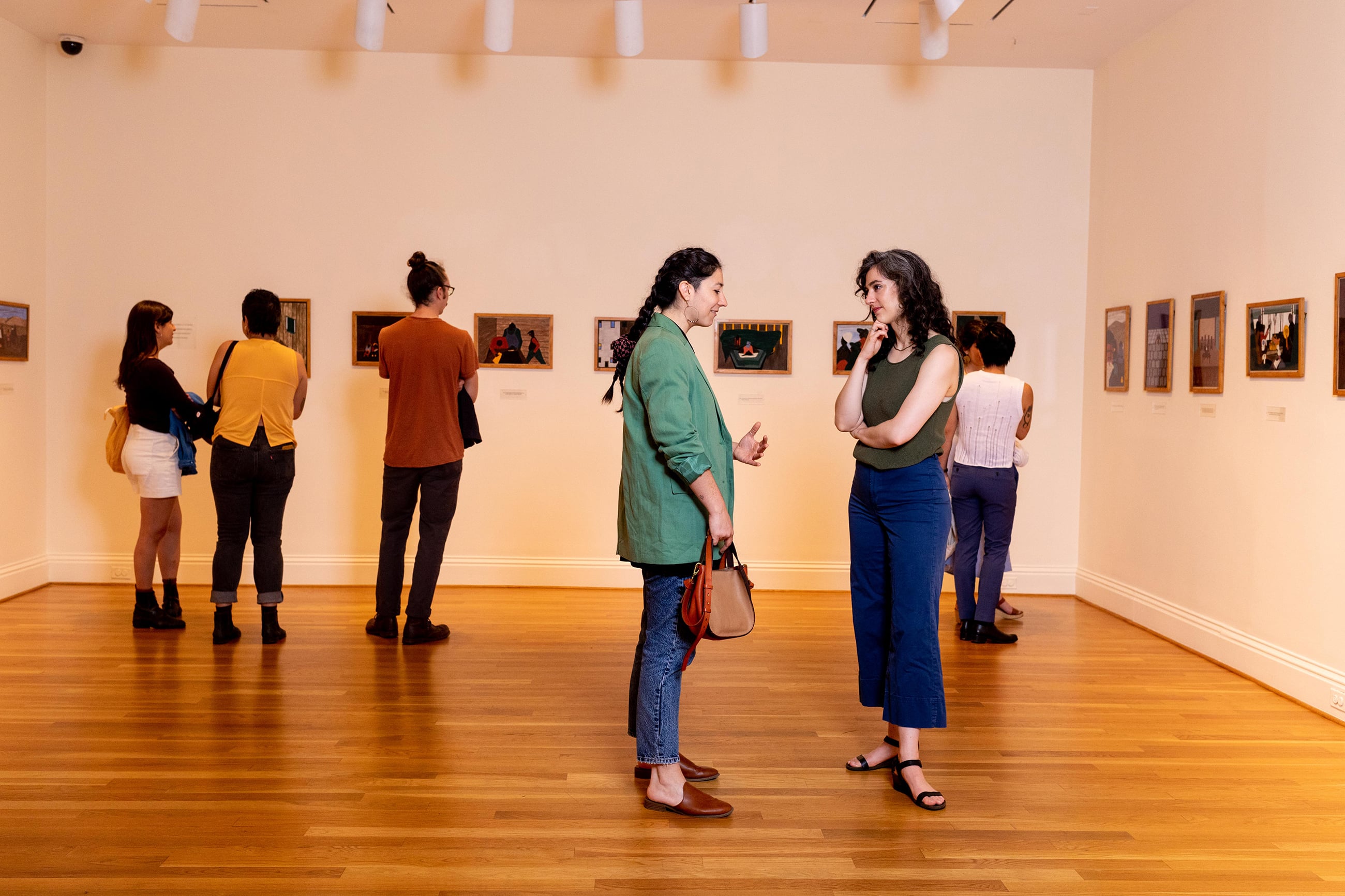 Guests-looking-at-Jacob-Lawrences-The-Migration-Series-panels_Photo_-Mariah-Miranda-Photography-scaled-down - Washingtonian