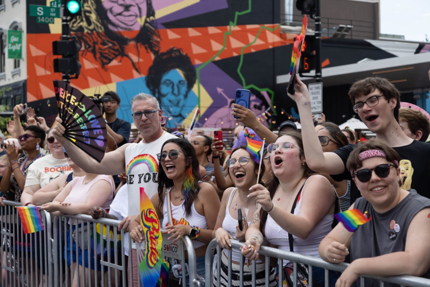 Pride attendees celebrate during Capital Pride's parade and festival. Photograph by Evy Mages.