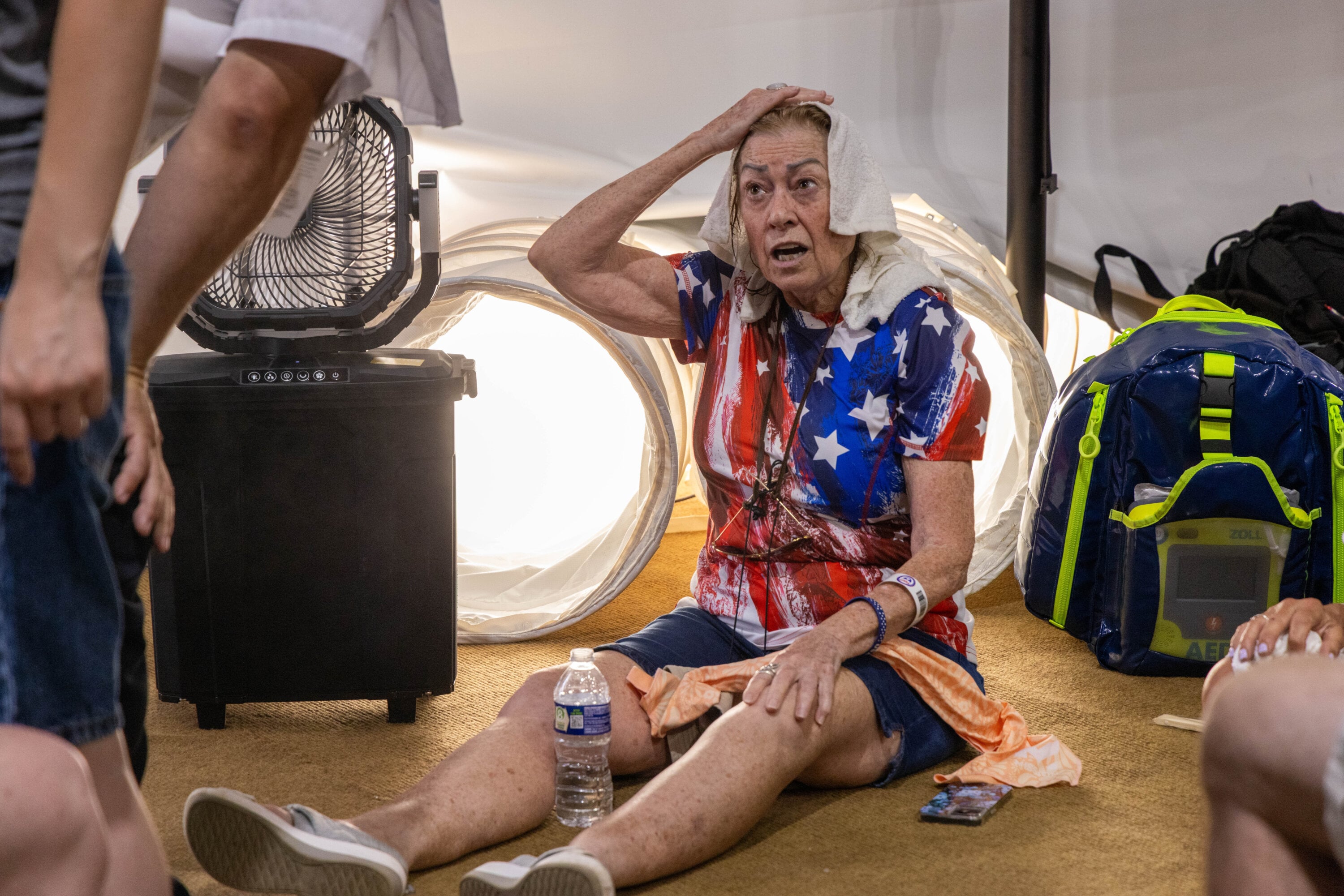 _67A9304 - Washingtonian An overheated woman in an American Flag outfit during the Fourth of July celebration on the National Mall.