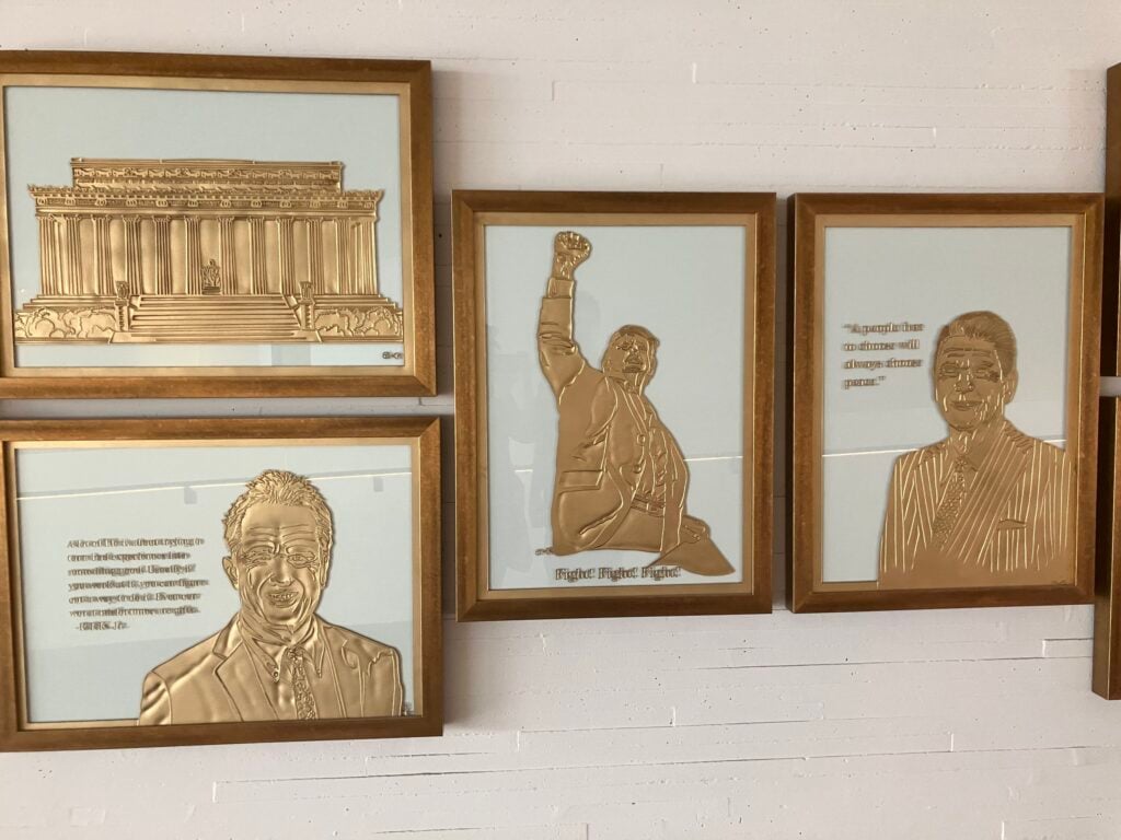 IMG_2322 - Washingtonian Gold-leaf artworks of the Lincoln Memorial, Robert F. Kennedy Jr., Donald Trump, and Ronald Reagan.