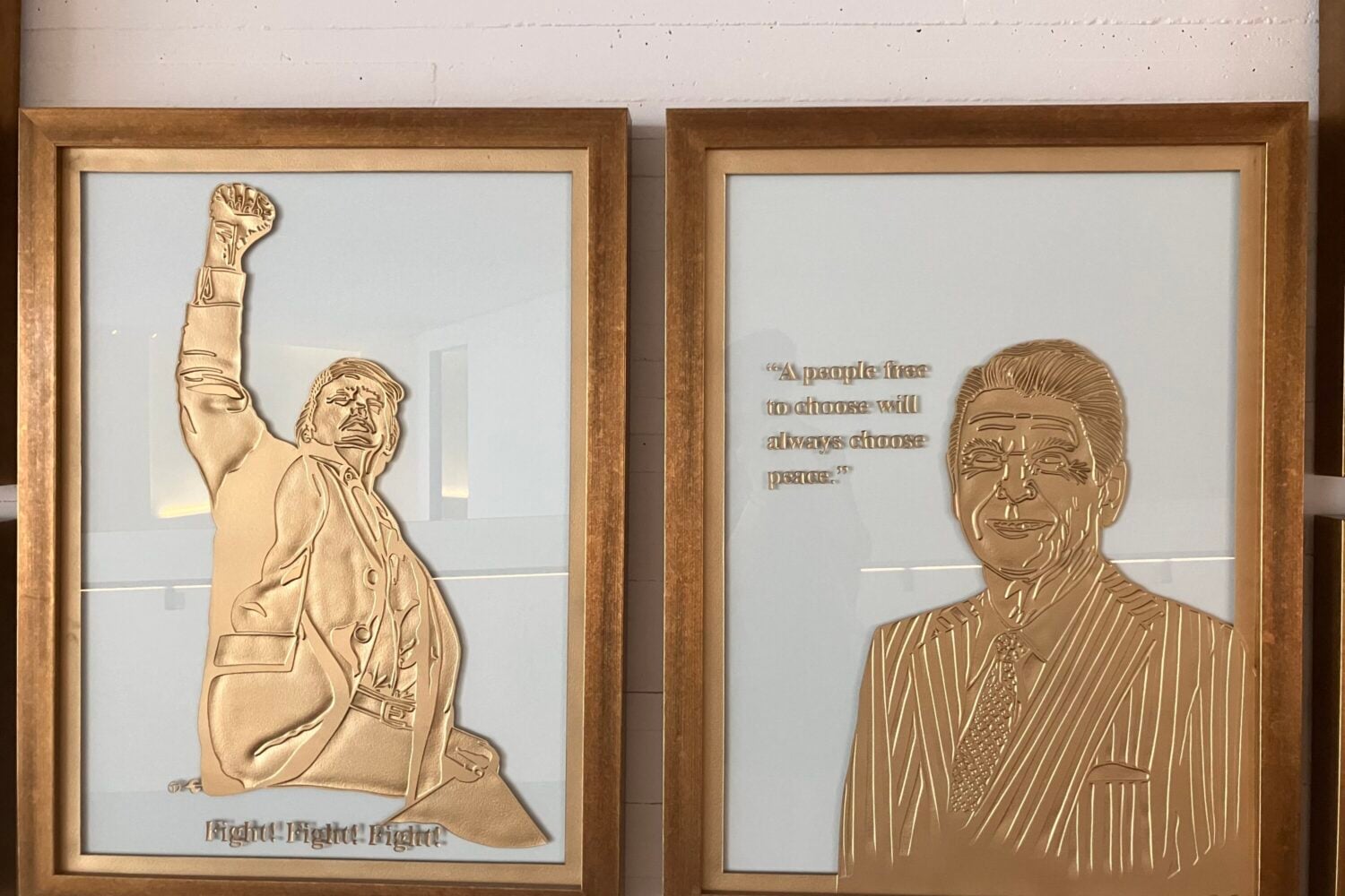 Gold-leaf portraits of Donald Trump and Ronald Reagan on display at the Kennedy Center.