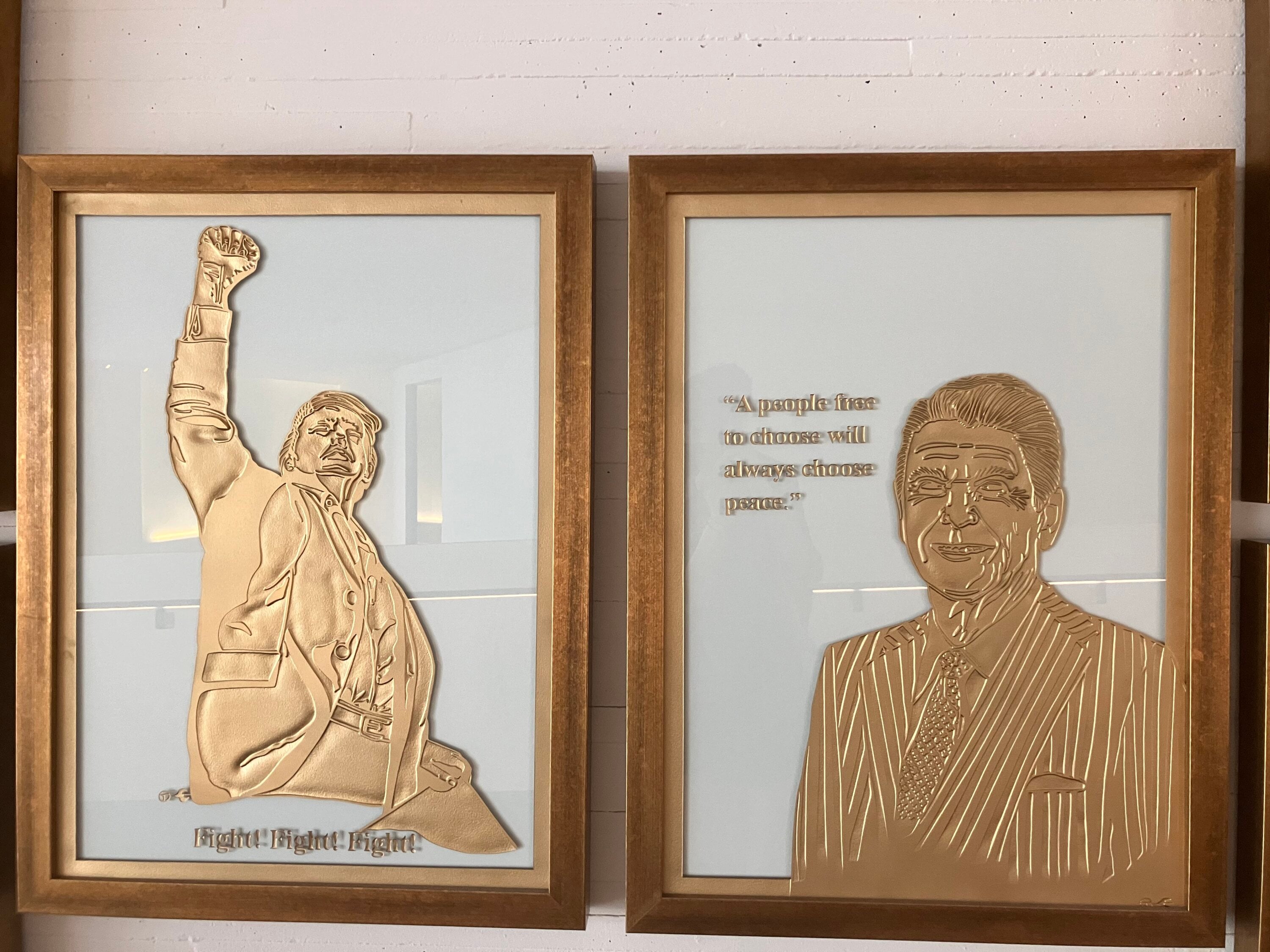 Gold-leaf portraits of Donald Trump and Ronald Reagan on display at the Kennedy Center.