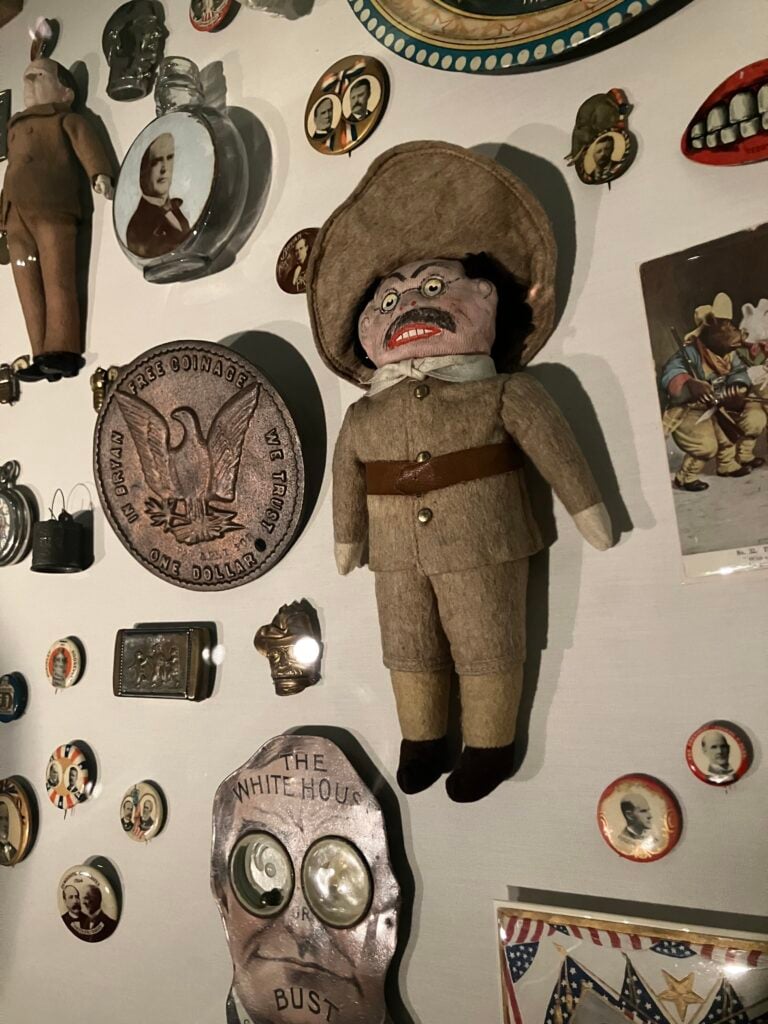A portion of a campaign memorabilia display, including a frightening Teddy Roosevelt doll.