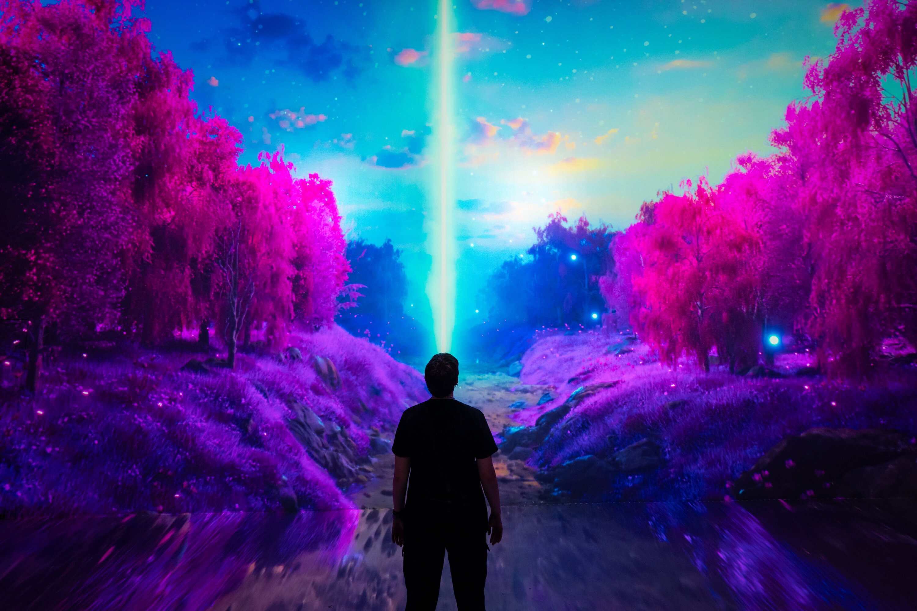 A surreal purple and blue landscape scene at Artechouse